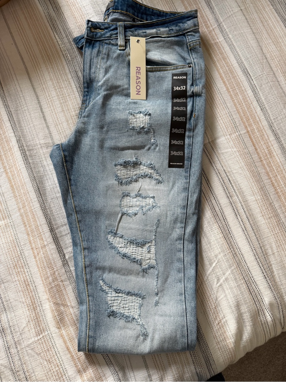 REASON men’s Light Blue Distressed Skinny Jeans